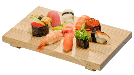 A wooden cutting board topped with sushi next to other food.